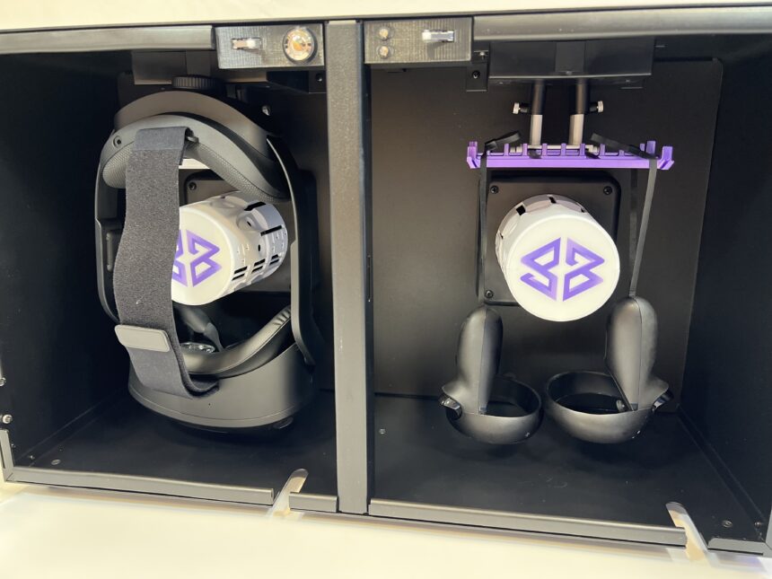 A headset and controllers being sanitized in a Cleanbox unit.